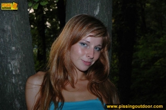 Outdoor pissing in the night of teen redhead girl - N