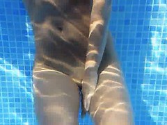 Underwater strip of charming boobs