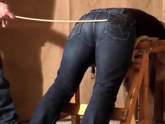 caned-over-tight-jeans-daddy-boy