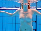 Big tits teen Lucie in the pool