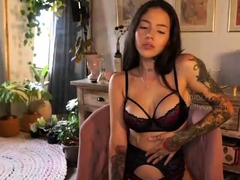 brunette-amateur-webcam-babe-pleases-pussy