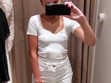 Sexy cutie takes a video of herself in the fitting room of t